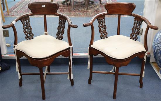 A pair of Chinese padouk corner chairs